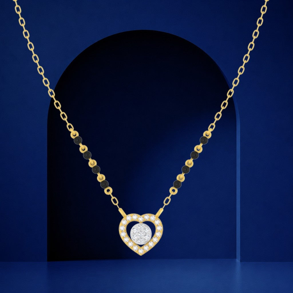 Yellow gold and and diamond Mangalsutra with a heart-shaped design on a blue background
