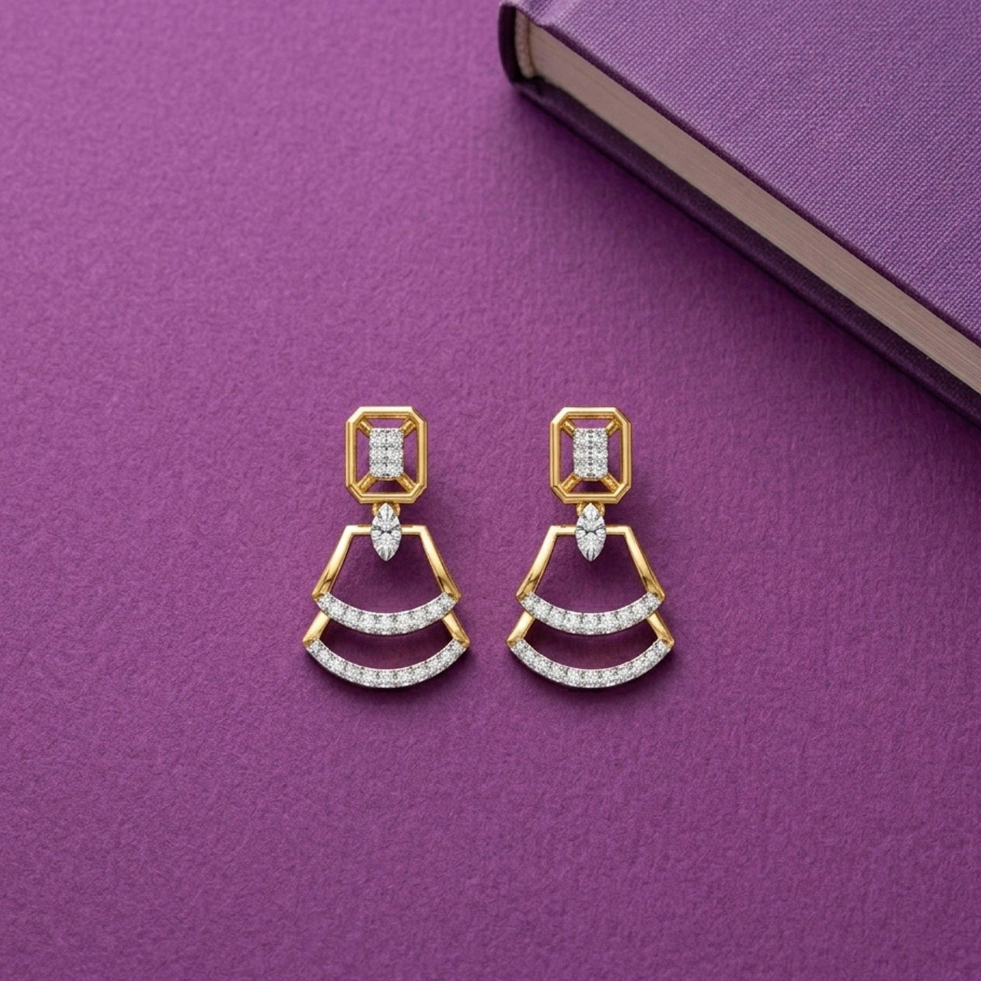 A pair of geometric yellow gold and diamond drop earrings, featuring a rectangular stud