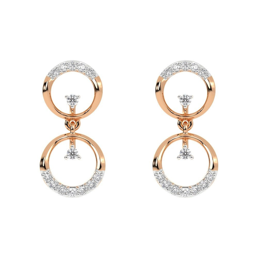 Rose gold and diamond earrings with circular designs on a white background