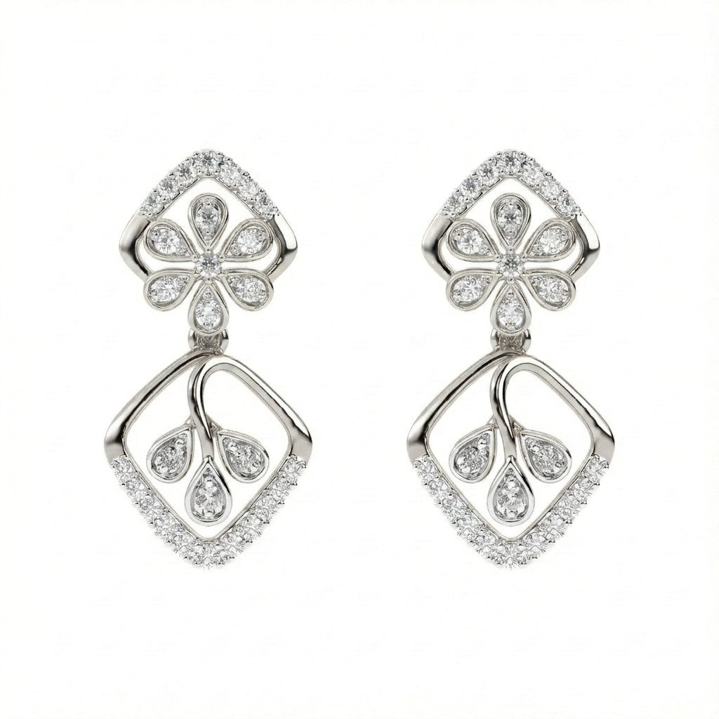 A pair of white gold earrings with diamond accents, featuring a floral and geometric pattern on a white background.