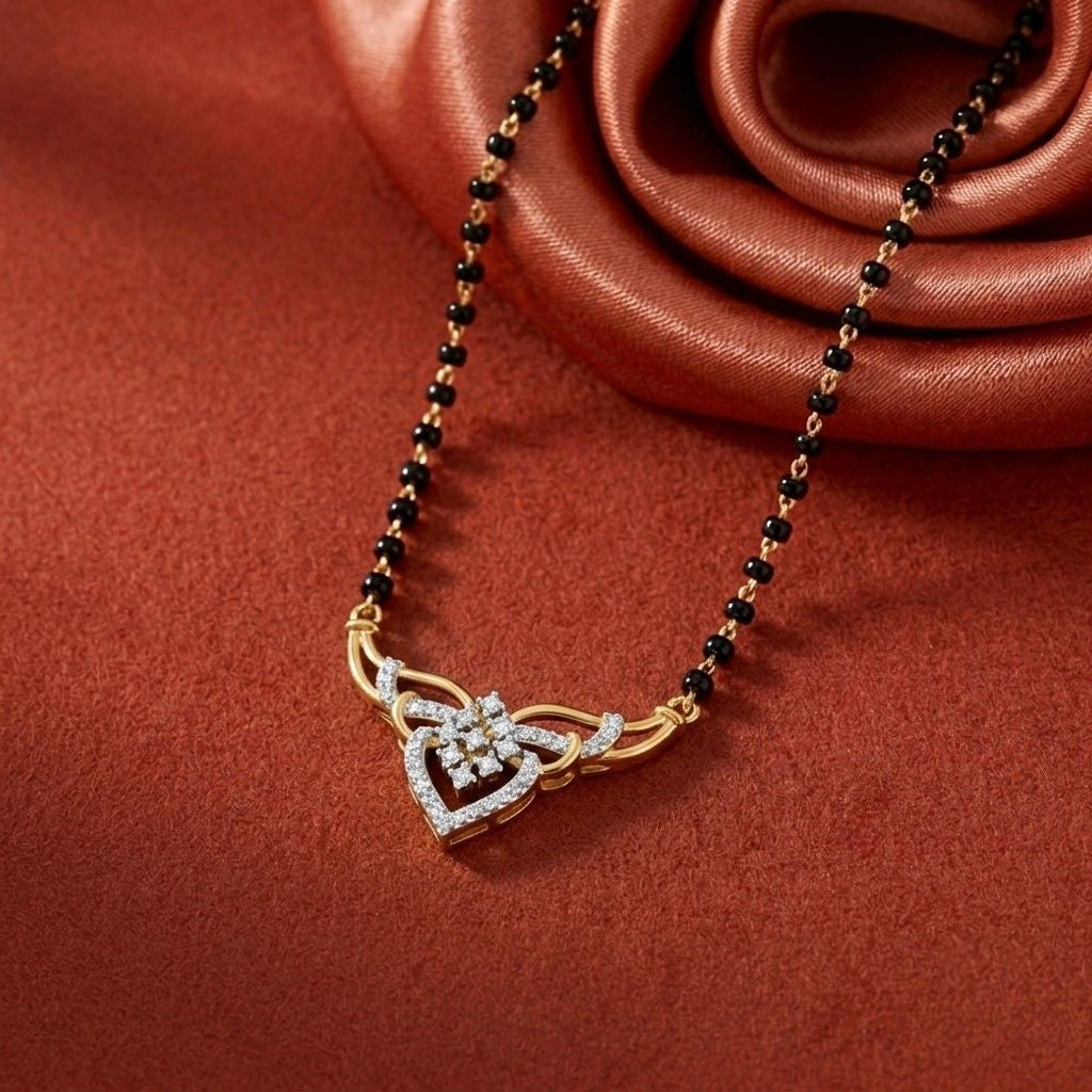 Yellow gold & diamond floral mangalsutra on a red background