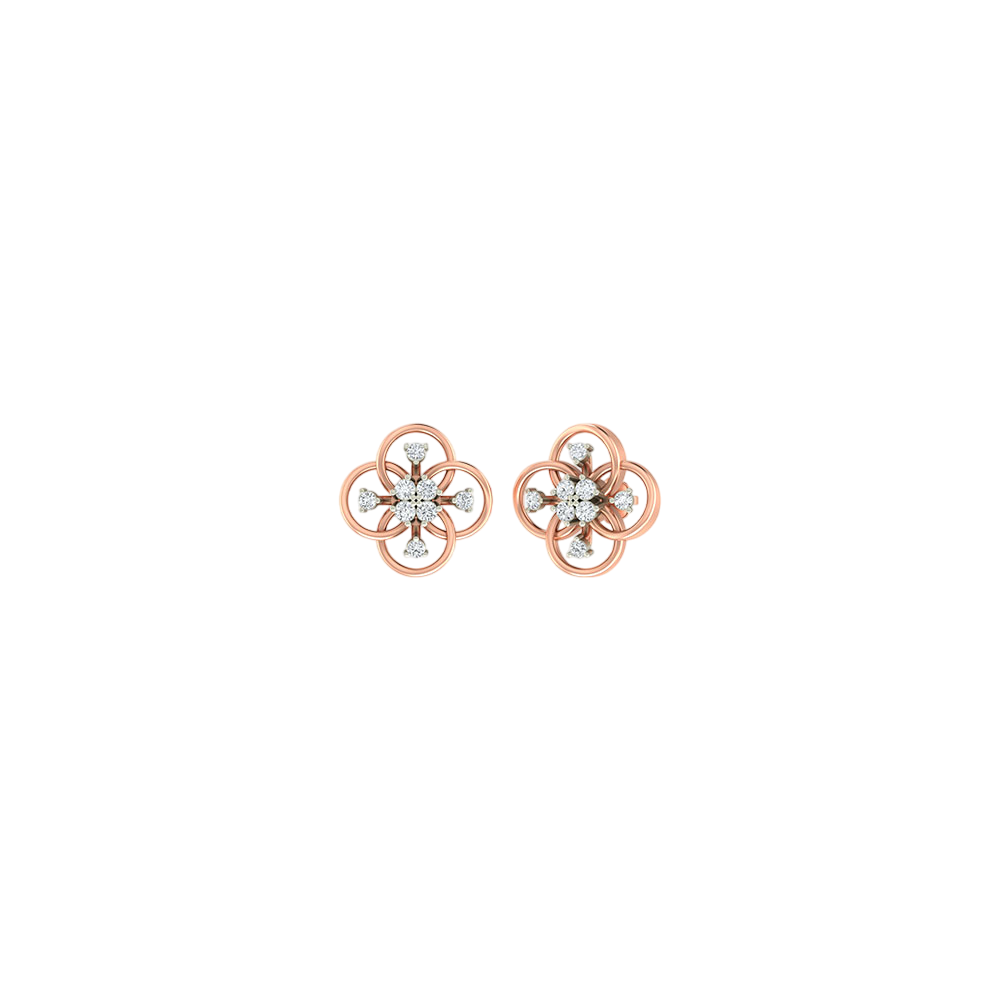 Pair of rose gold flower-shaped earrings with diamond-like stones on a white background