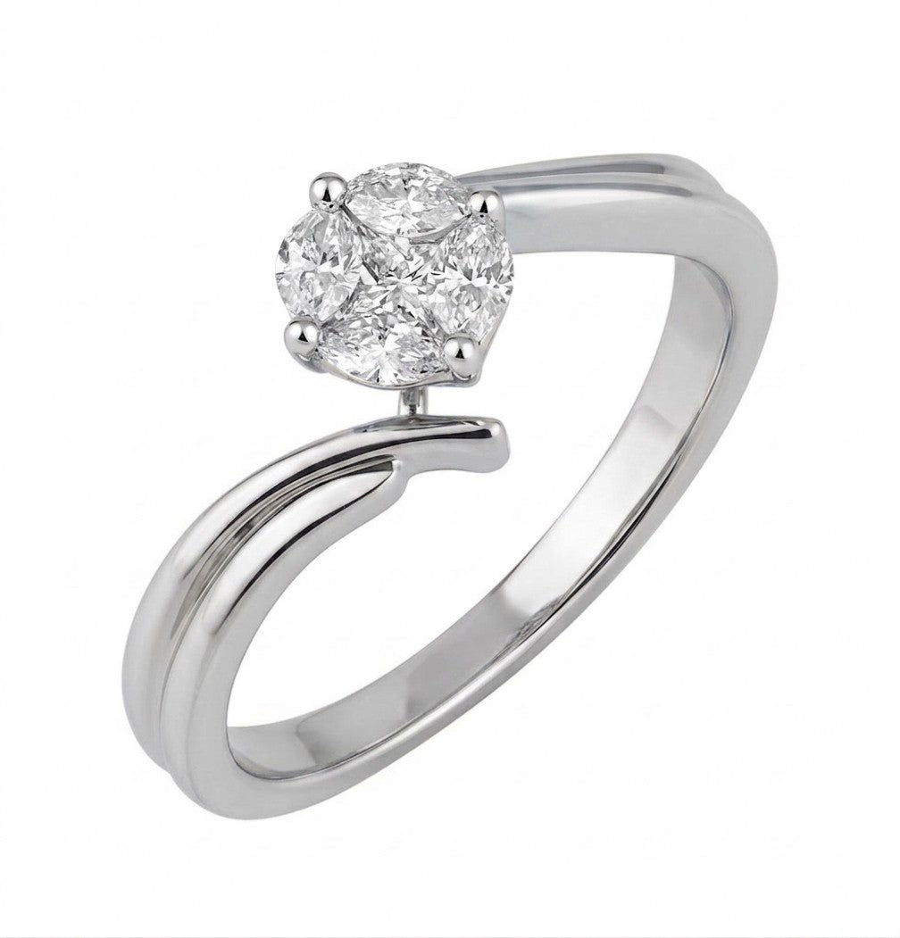 A white gold ring with a round-cut diamond setting on a plain white background.