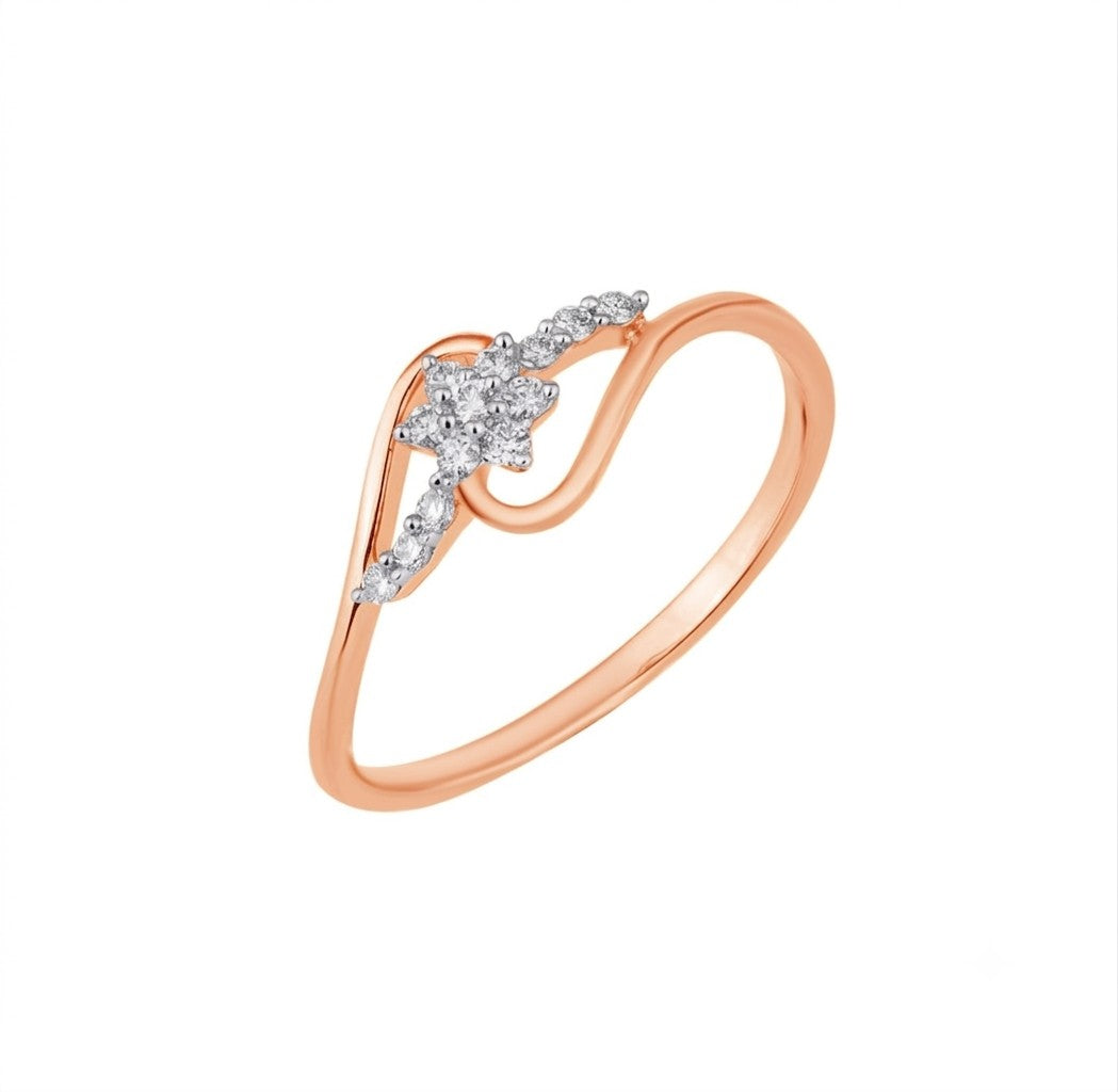 Rose gold and diamond with floral-design cluster setting on a white background.
