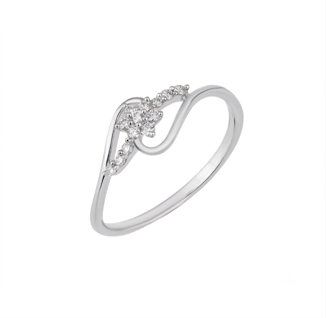 White gold and diamond with floral-design cluster setting on a white background.
