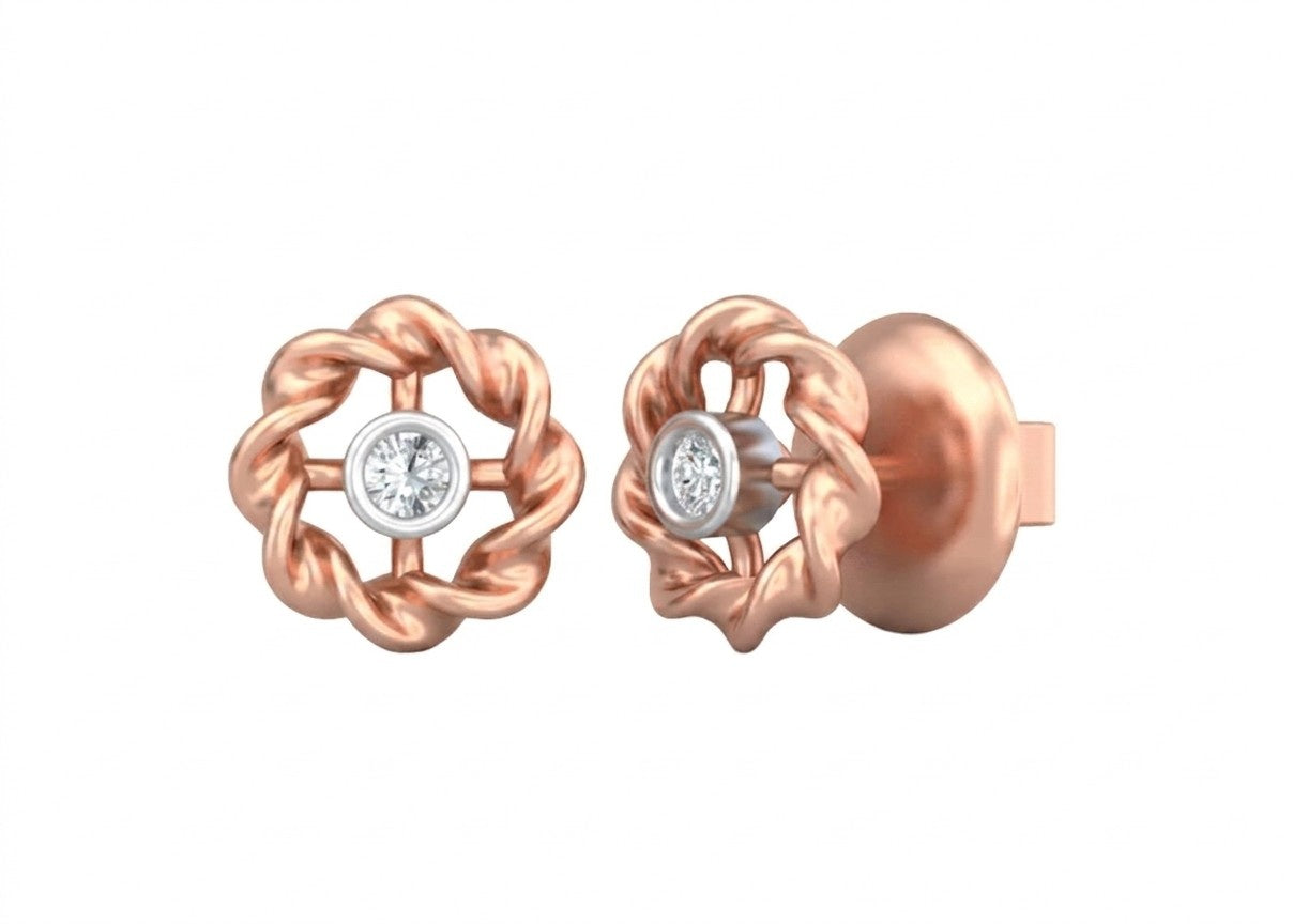 Rose gold and diamond floral earrings on a white background