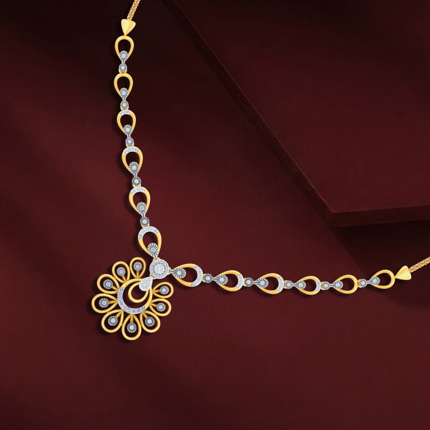 Gold and diamond necklace on a dark red background