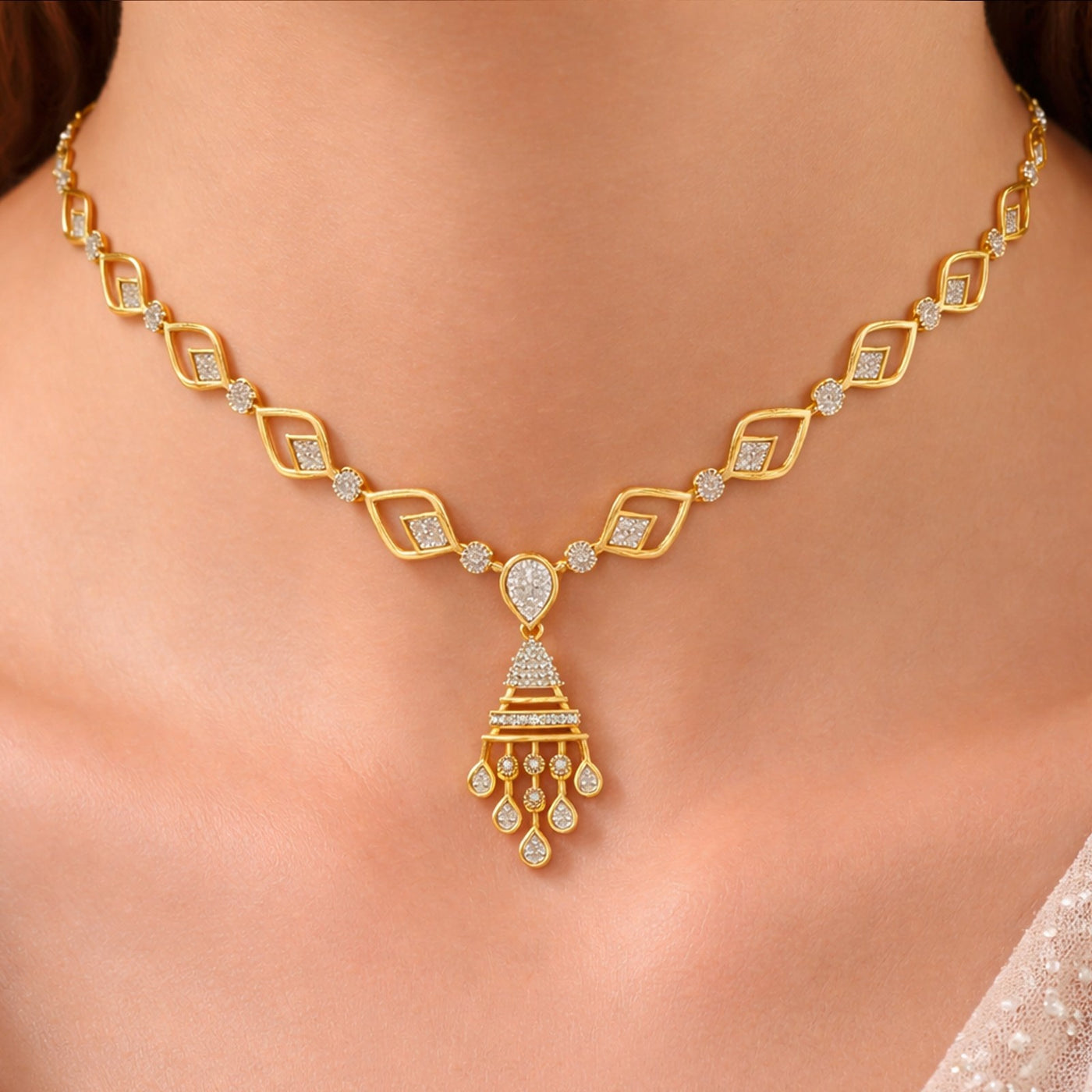 Gold necklace with diamond-like stones on a person's neck