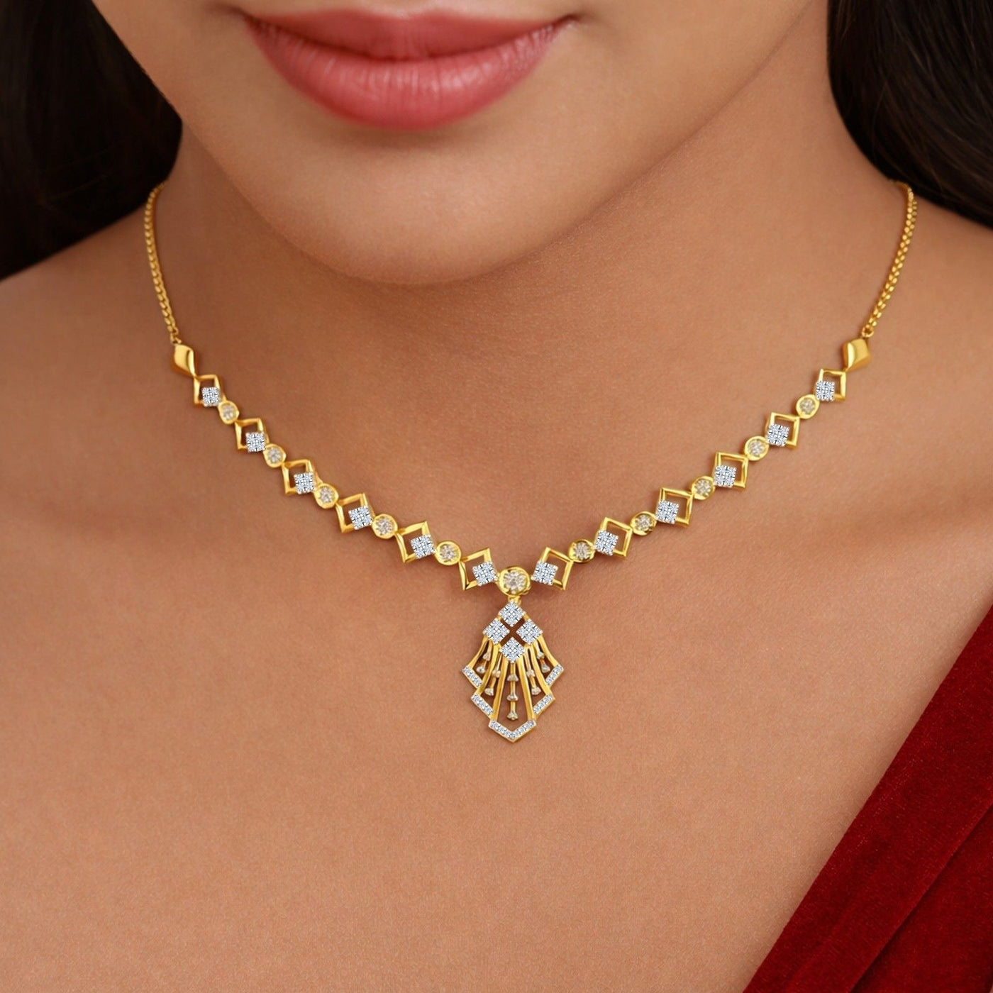 A close-up of a woman wearing a gold necklace set.