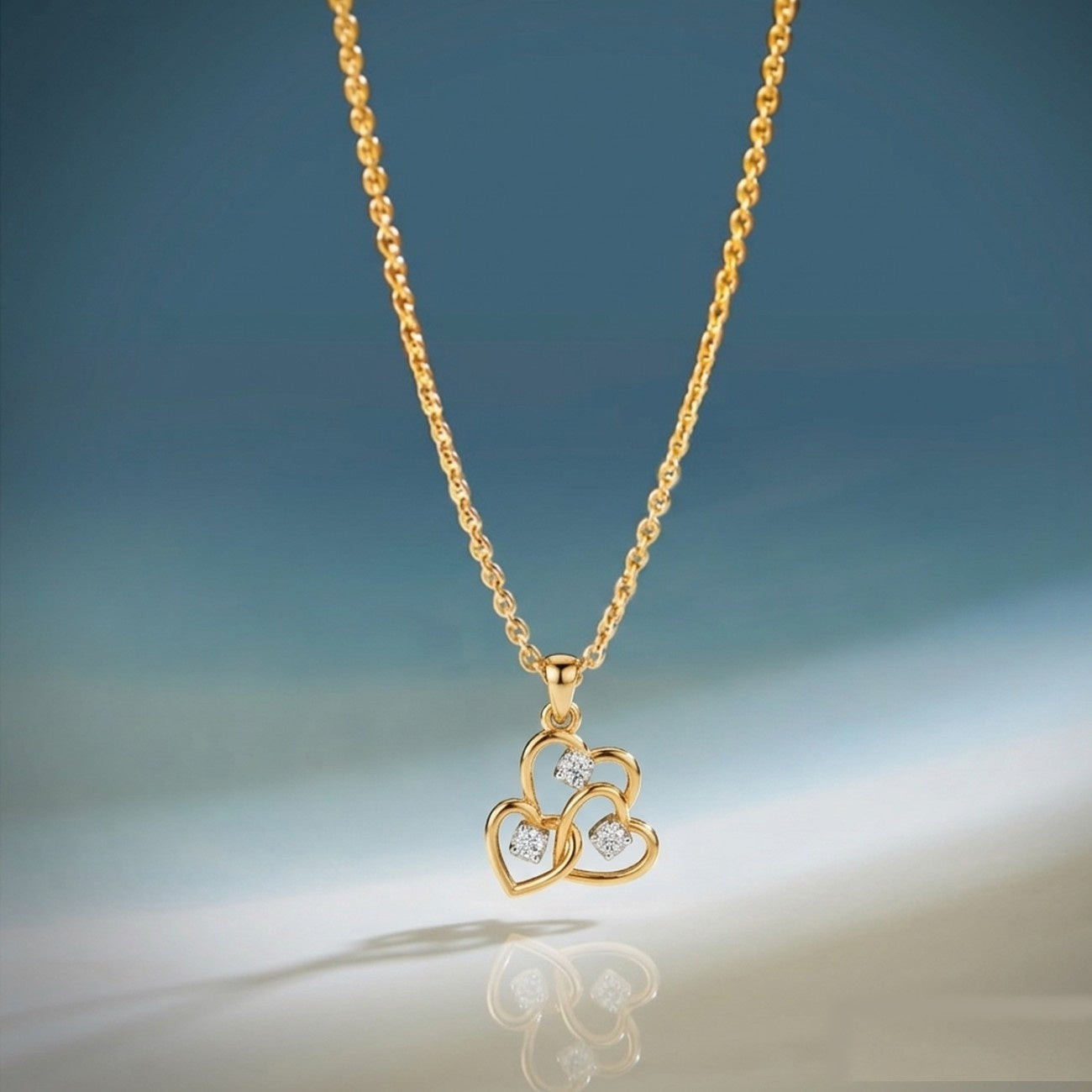 Gold necklace with a heart-shaped pendant on a gradient background