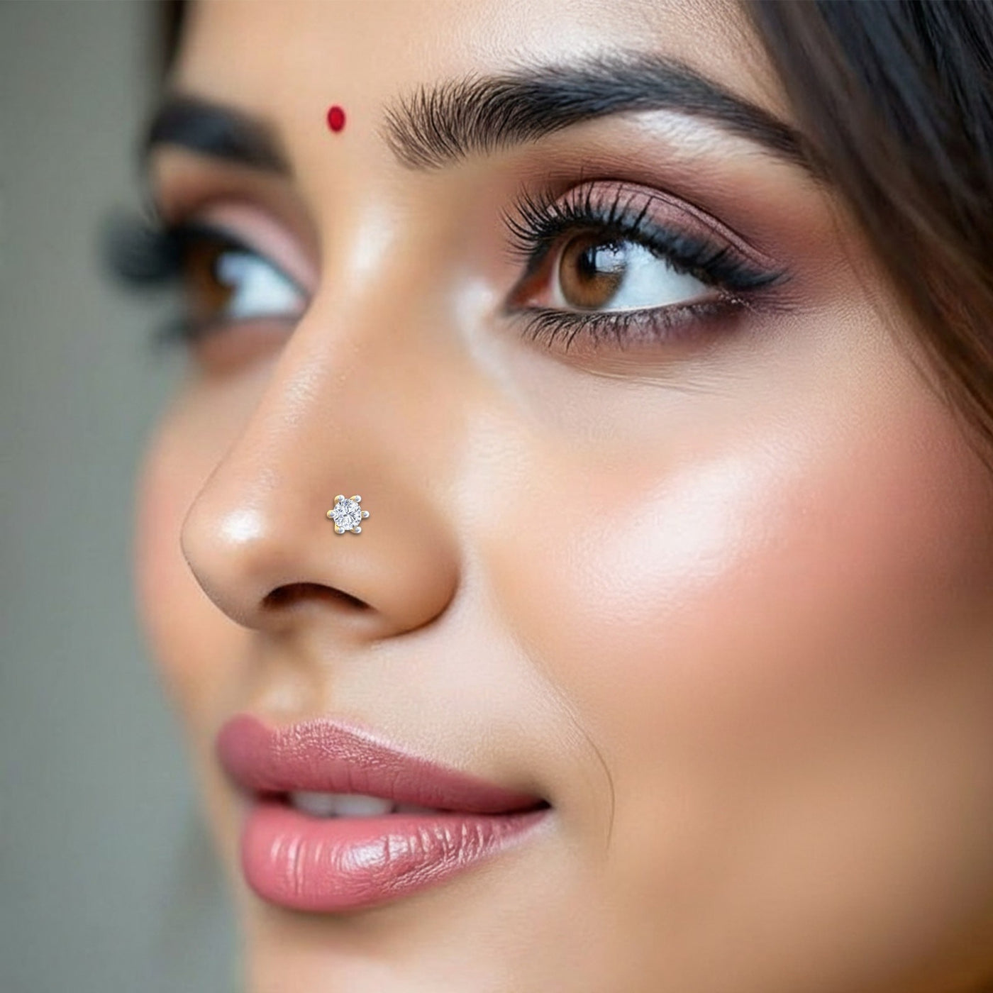 Close-up of a woman's face with a focus on her nose and lips.
