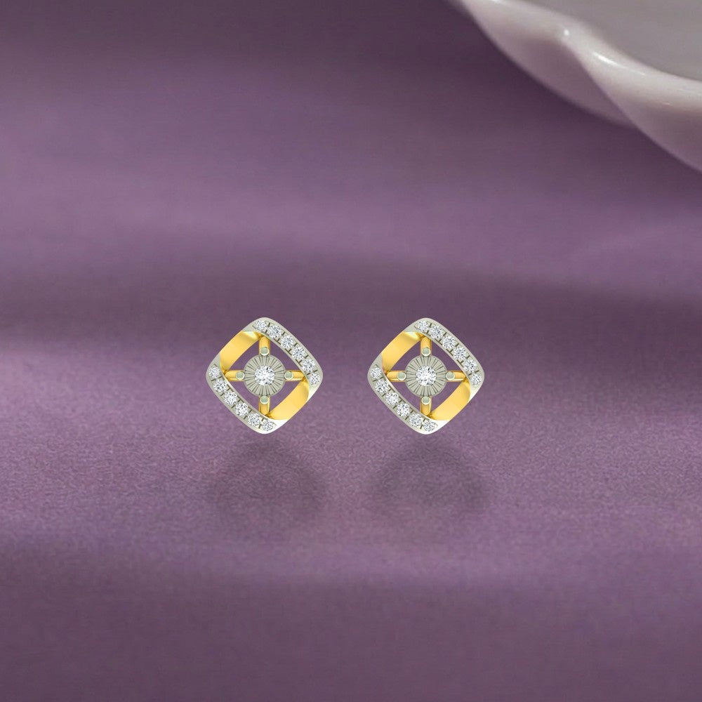 Gold earrings with diamond accents on a purple background.