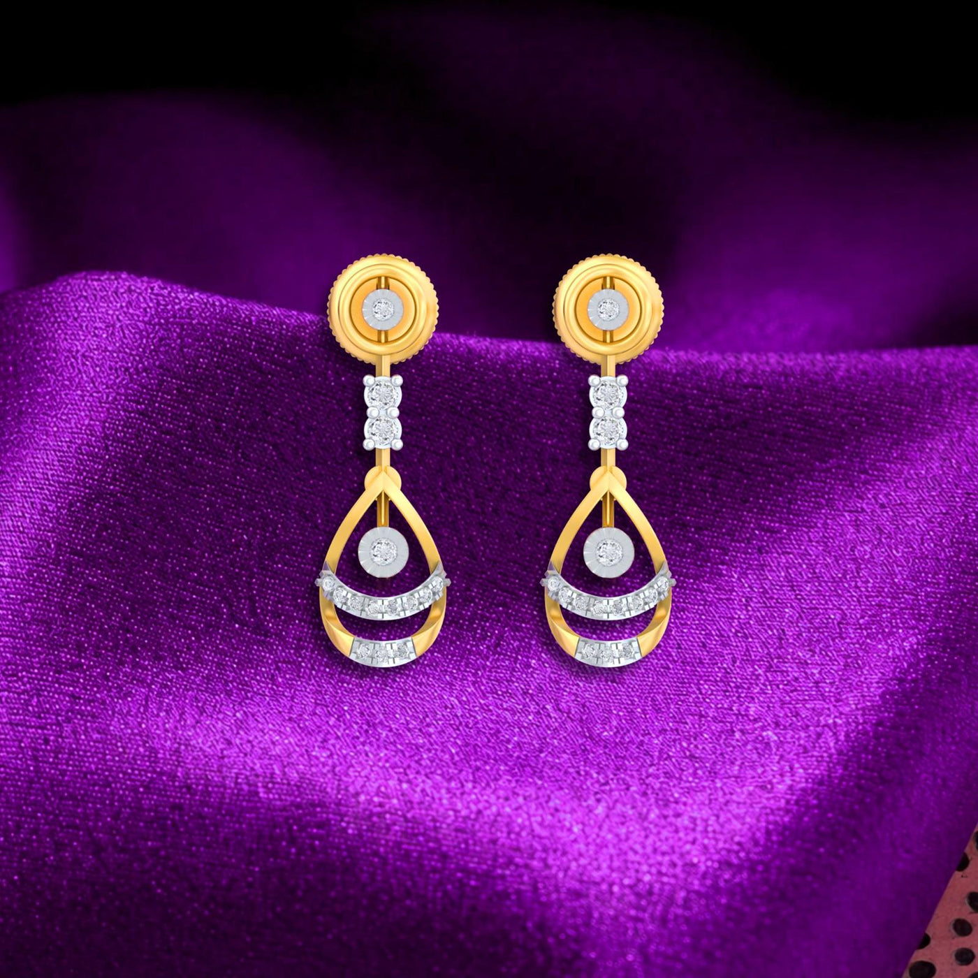 Gold and diamond dangler earring on a purple surface.