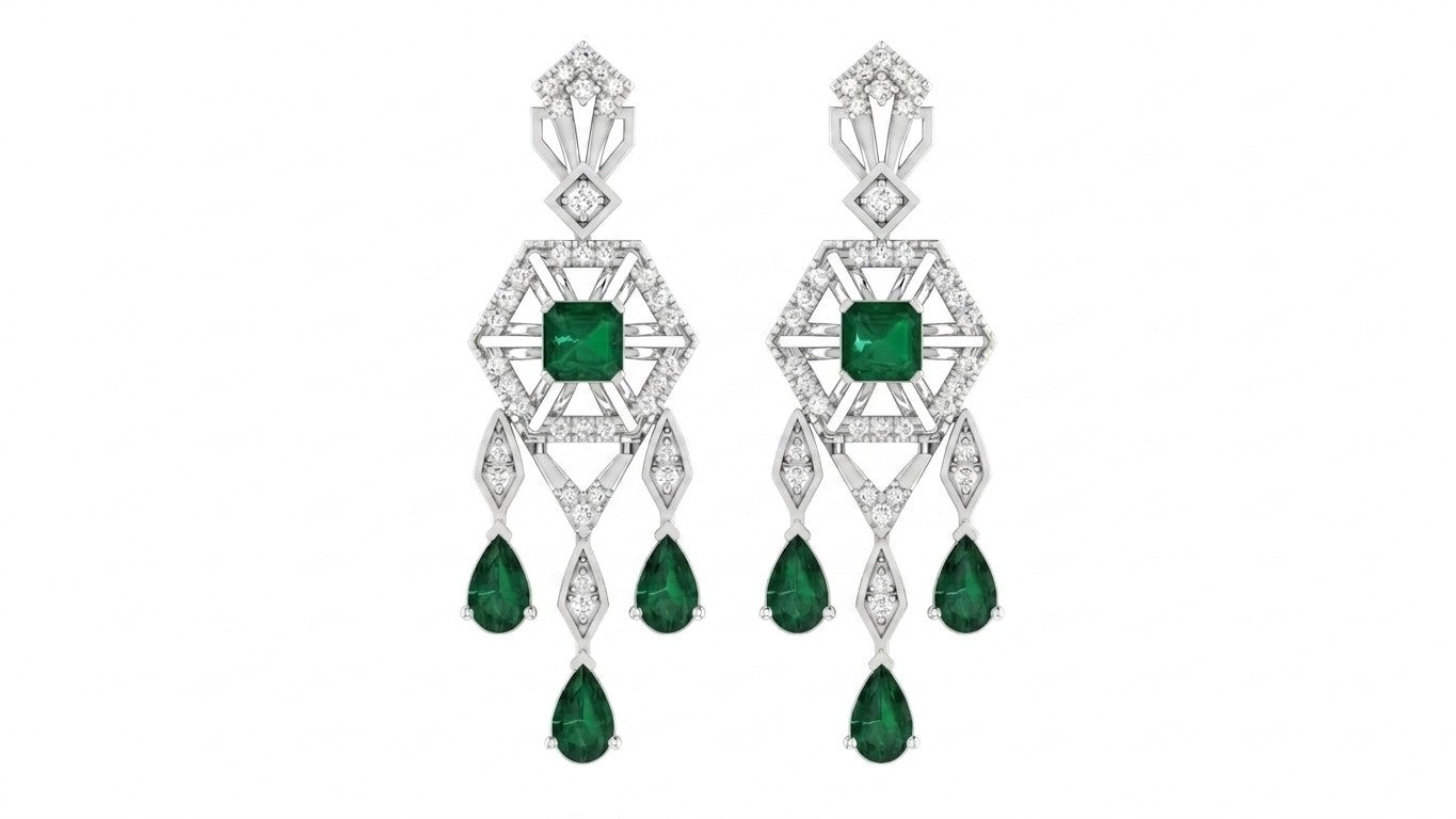 A pair of white gold chandelier earrings featuring green emerald-cut gemstones, shown against a plain white background.