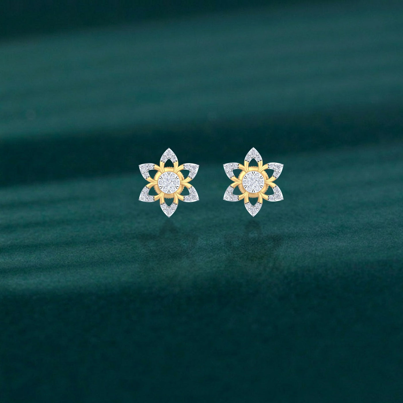 Gold and diamond stud earring with floral-shaped on a teal background.
