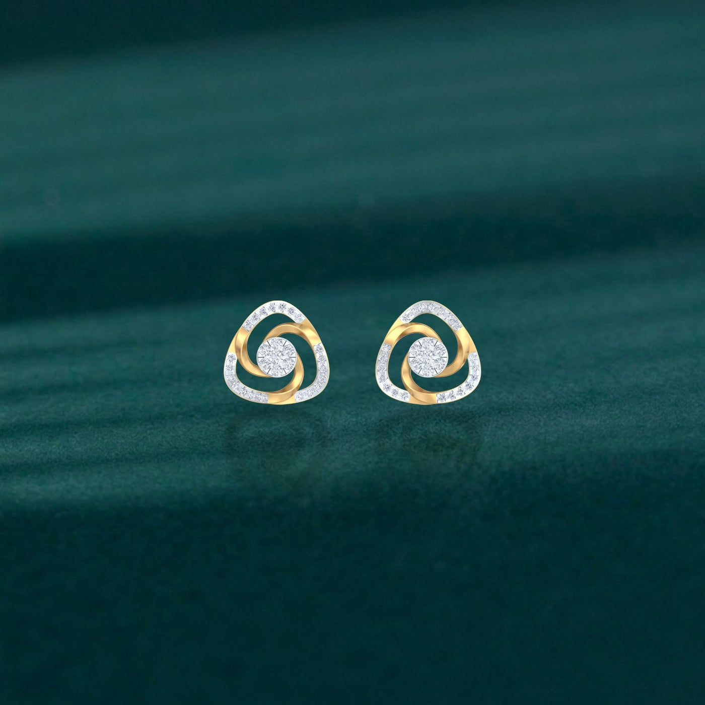 Gold and diamond stud earring on a teal background.