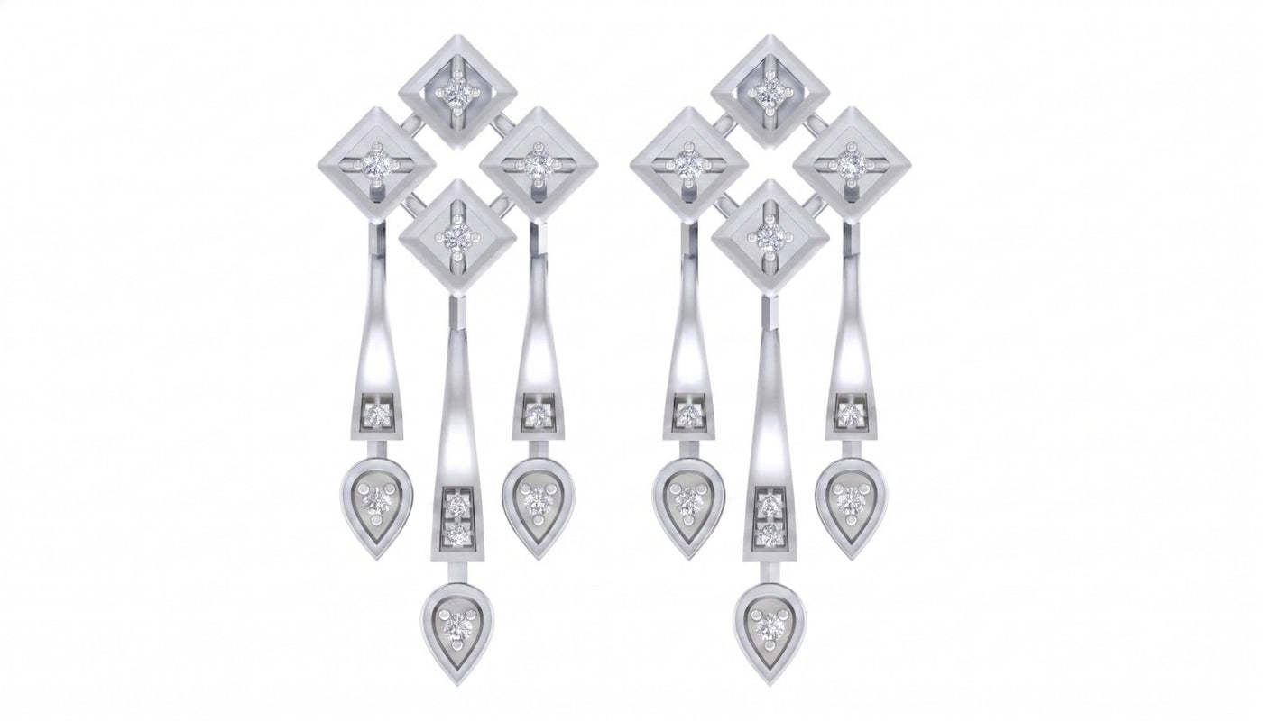 White gold and diamond chandelier earrings on a white background