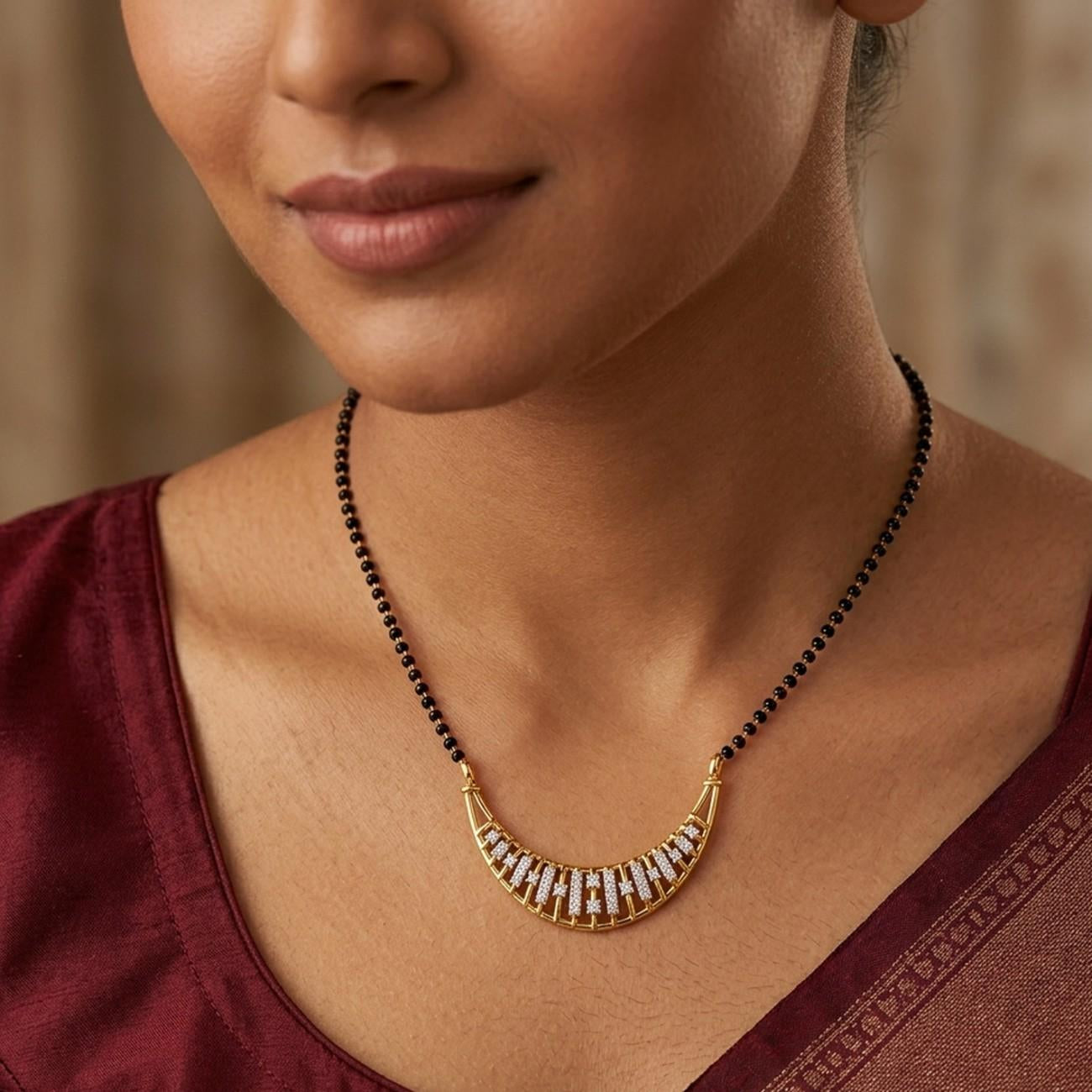 Women wearing gold & diamond beaded mangalsutra