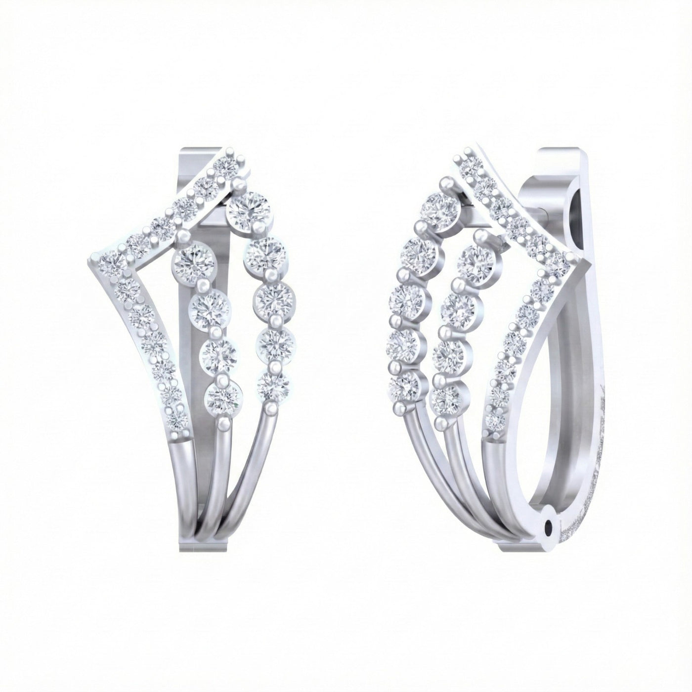 White gold and diamond hoop earrings with diamond accents on a white background.