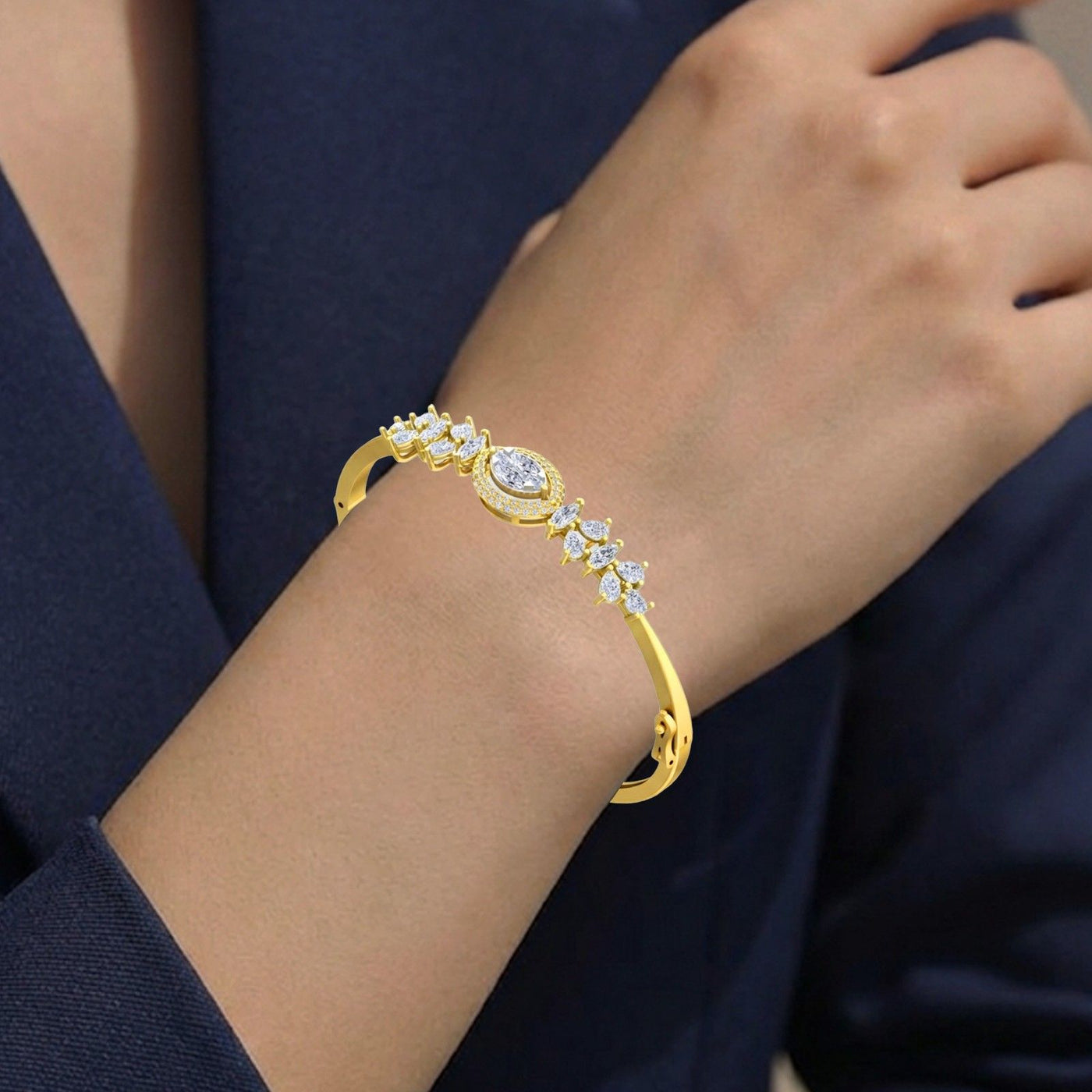 Gold bracelet with diamonds on a wrist against a dark background