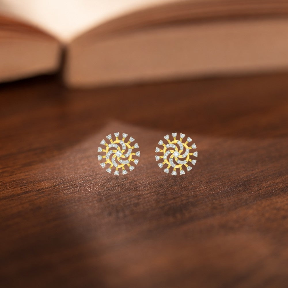 Gold and diamond floral women stud earrings with radiant diamond accents in wooden surface.