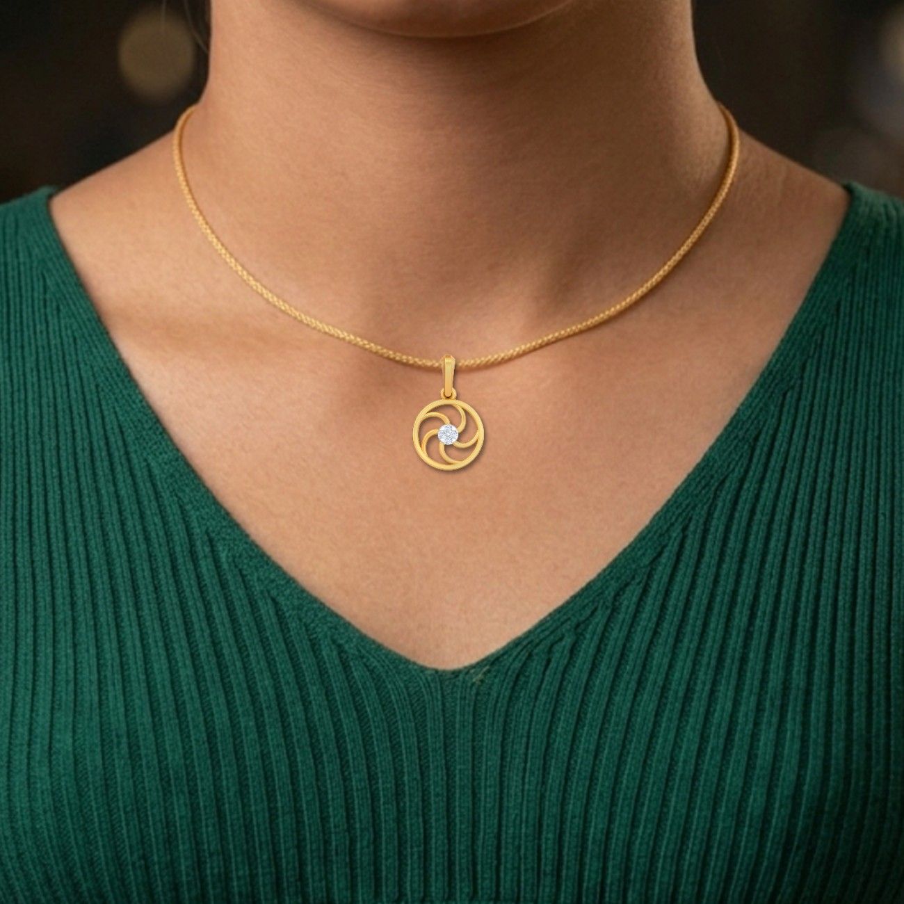 Gold and diamond pendant designed for timeless beauty.