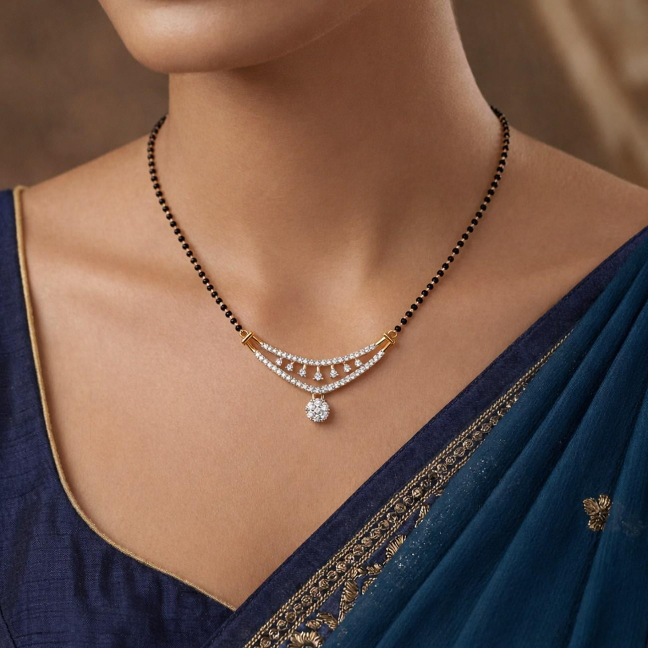 Women wearing gold & diamond bridal mangalsutra 