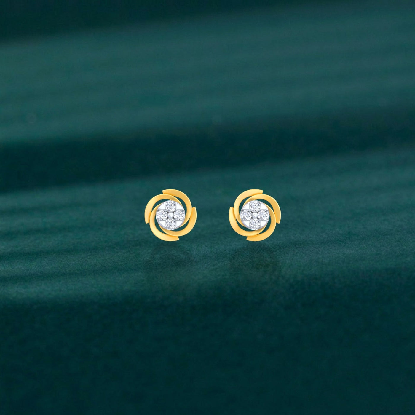 Pair of gold and diamond round-shaped stud earrings on a teal background.