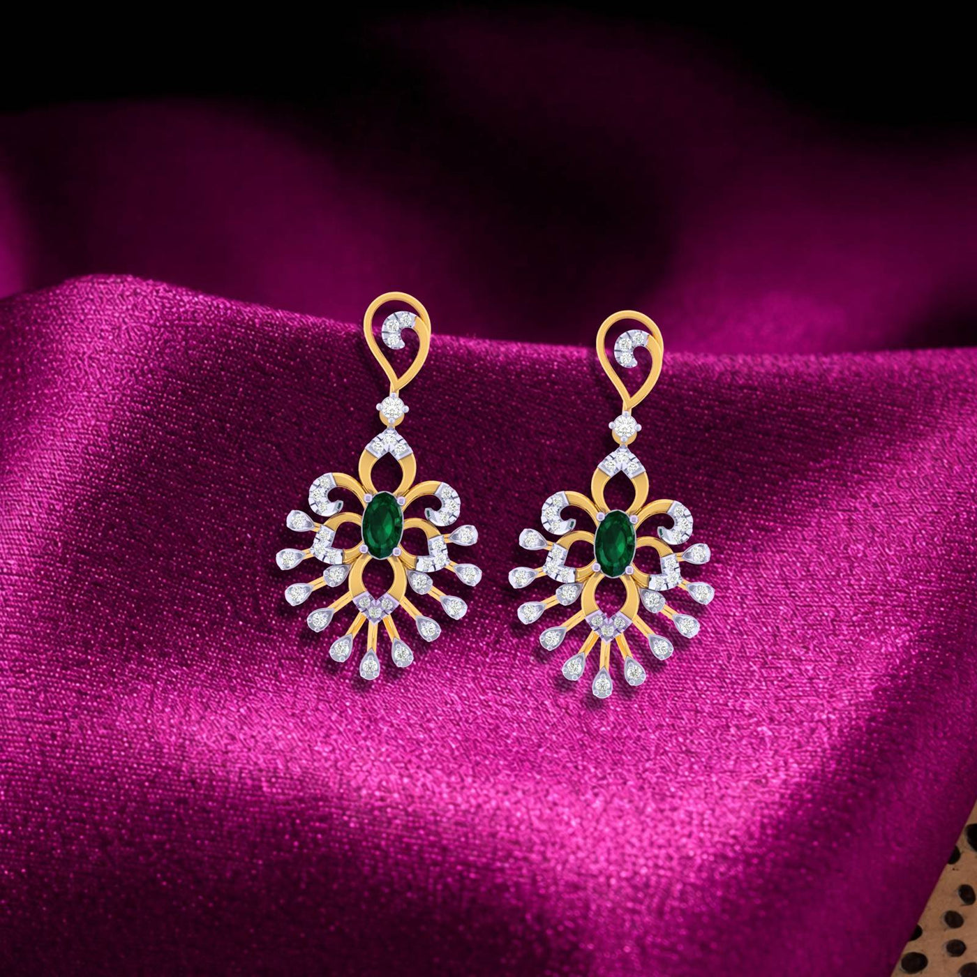 Gold and diamond drop earrings with gemstones on a megenta background
