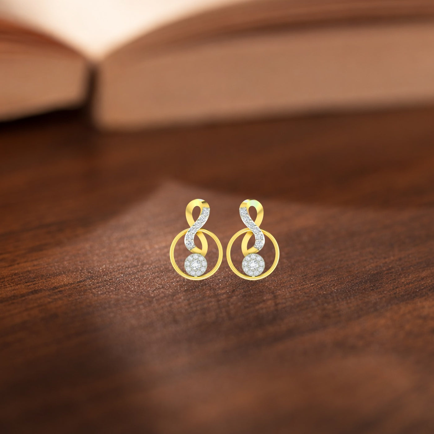 Gold and diamond stud earring with round-shaped on a wooden background.