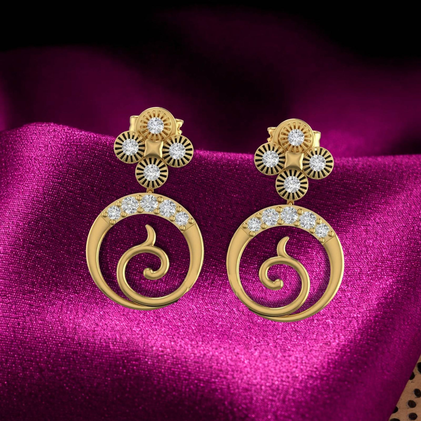 Gold and diamond drop earring on a magenta fabric background.