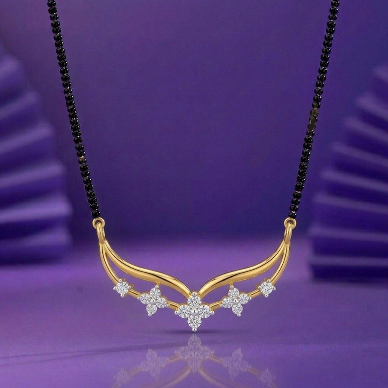 Yellow gold & diamond floral mangalsutra on purple background
