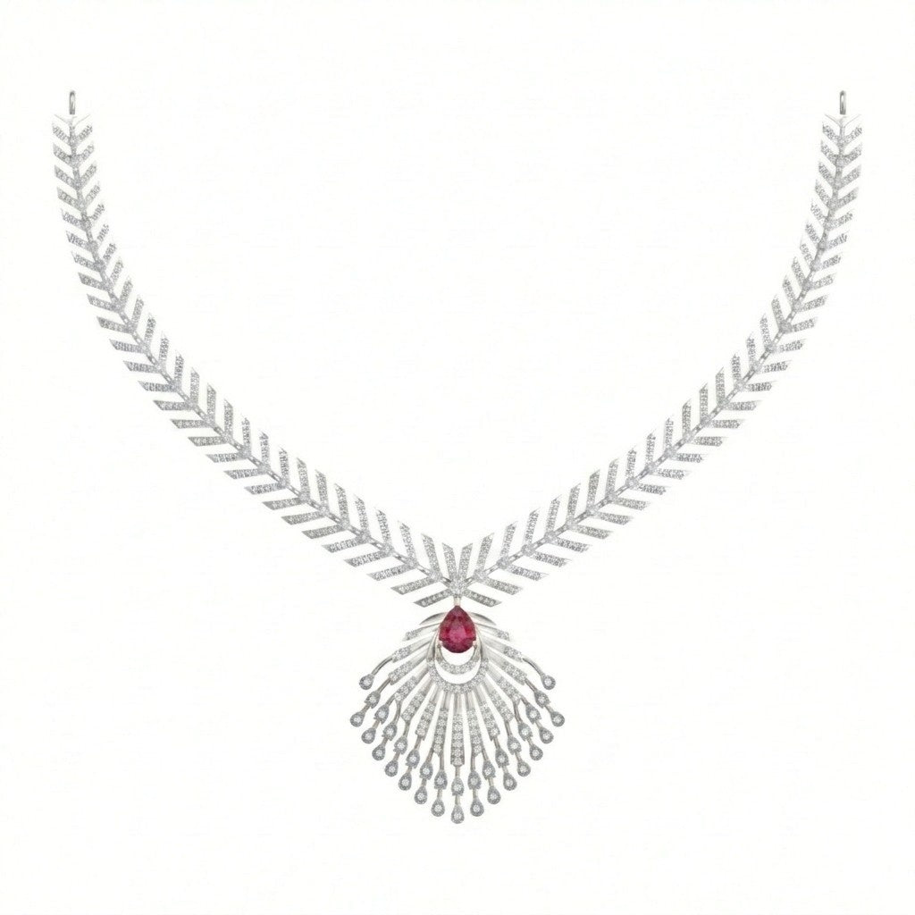 A white gold and diamond necklace with a central gold V-shape, a red teardrop ruby gemstone on a plain white background.