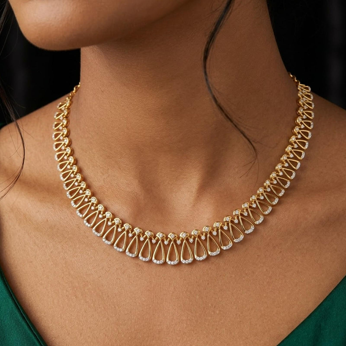 Women wearing a gold and diamond necklace set.