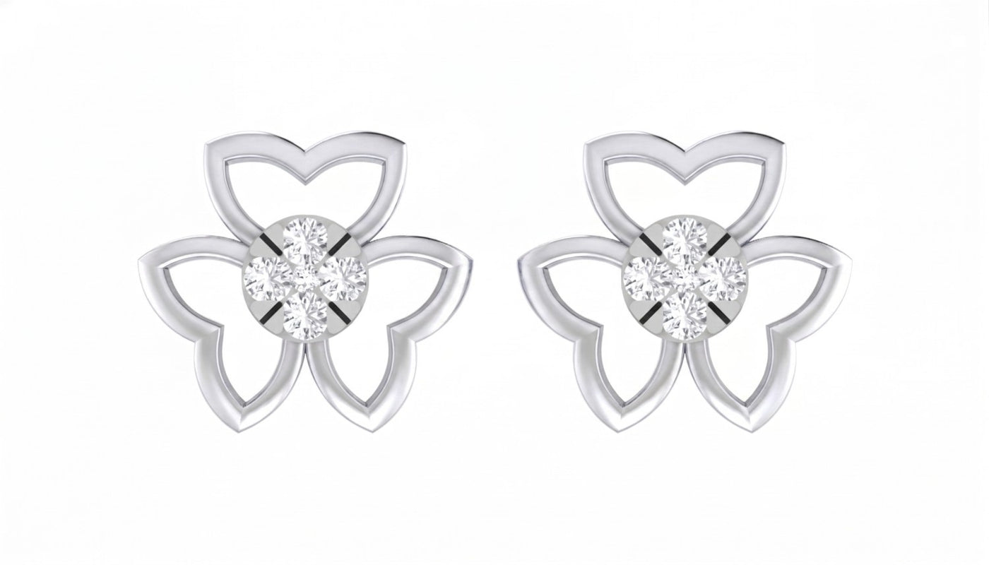 White gold and diamond floral-shaped earrings on a white background