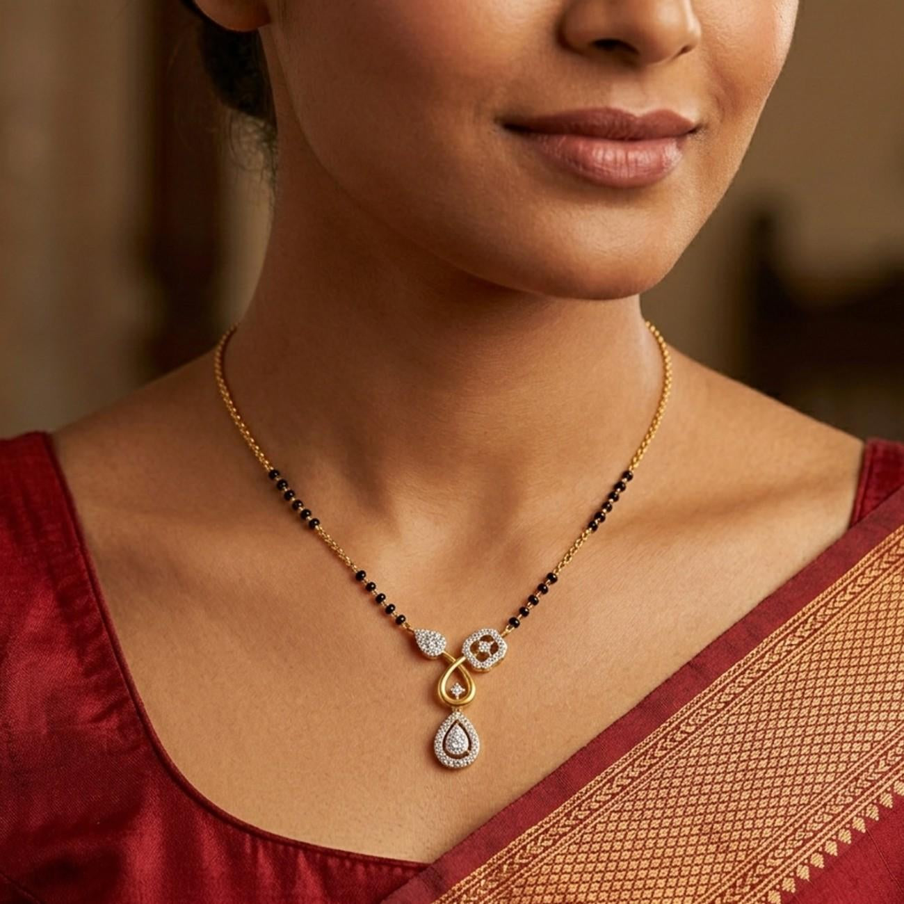 Women wearing gold & diamond floral mangalsutra