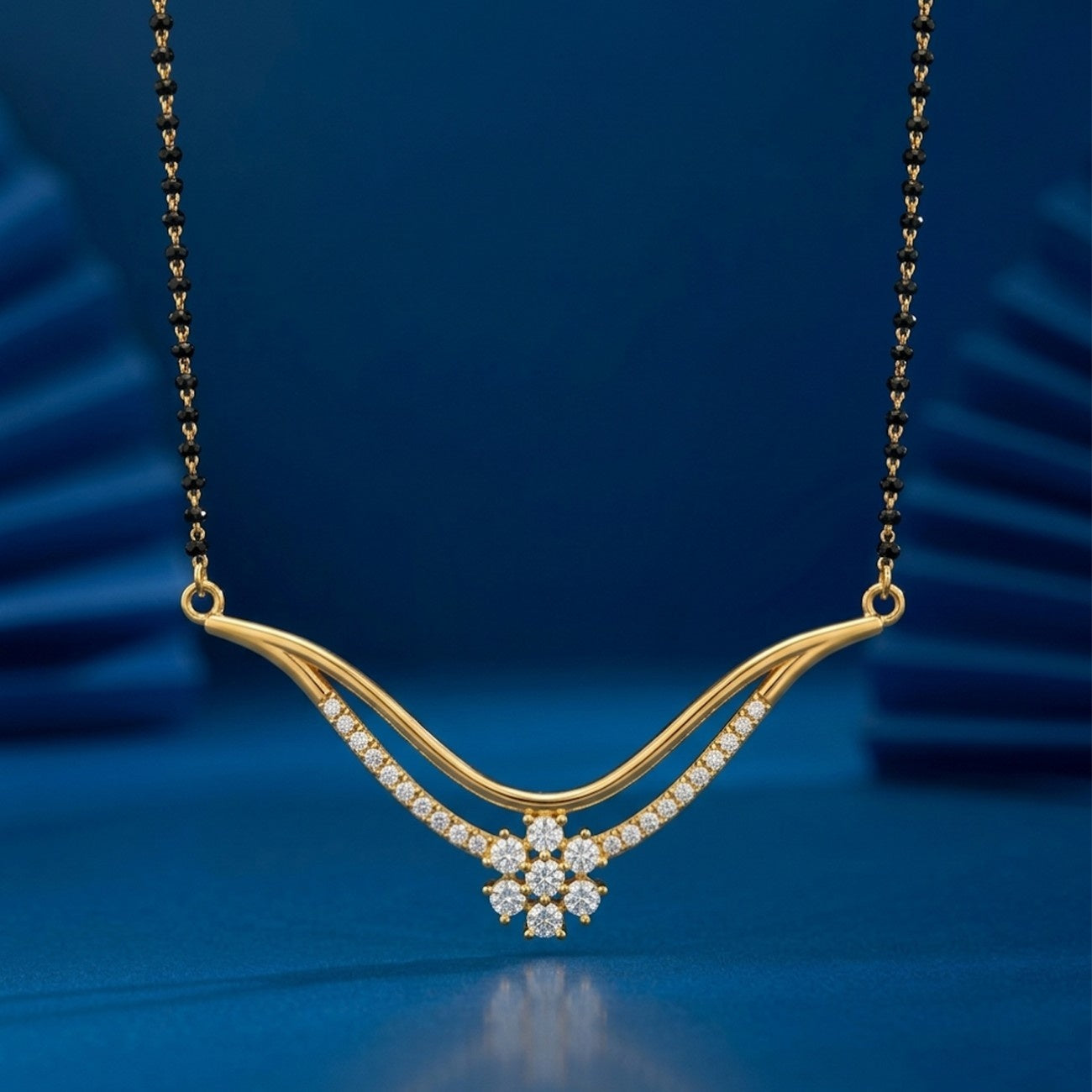Yellow Gold & Diamond Elegant Modern Mangalsutra On blue Background
