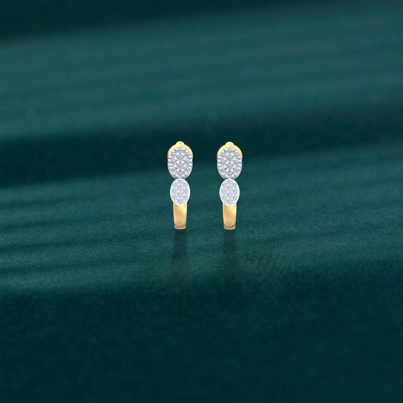 Elegant gold half hoop earrings featuring sparkling natural diamonds  on a teal background.