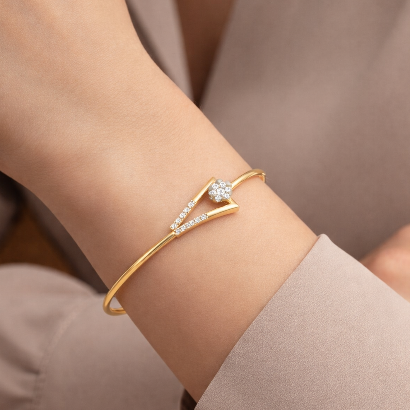 Elegant yellow gold diamond bracelet worn on wrist