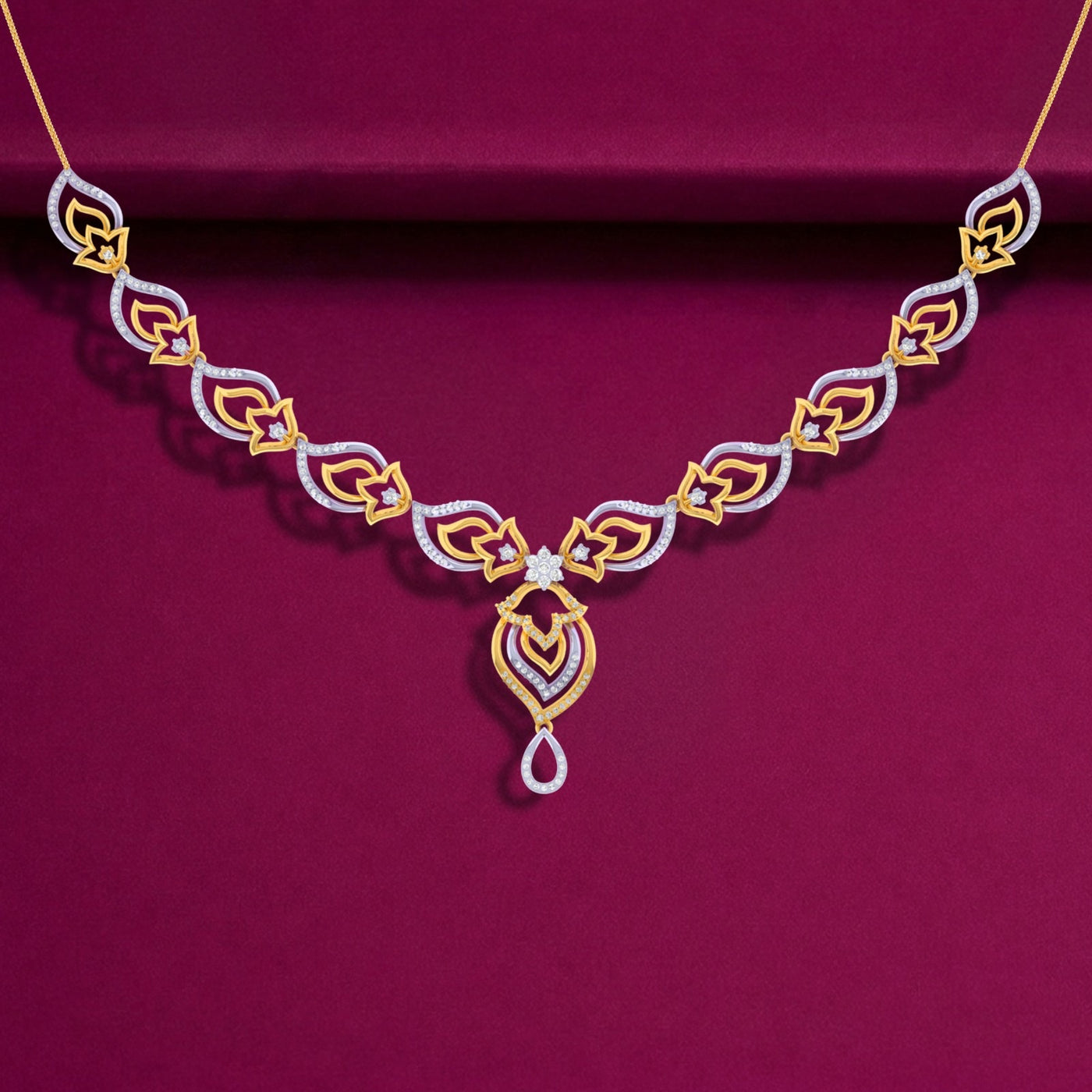 Gold and diamond necklace on a purple background