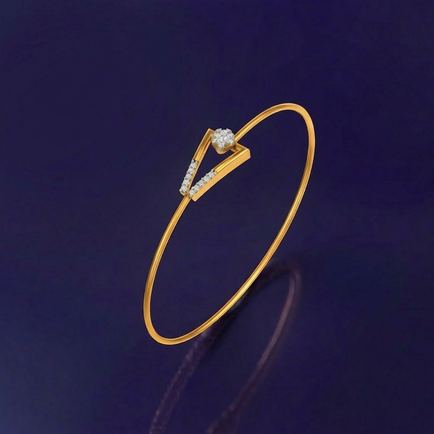 Gold bracelet with a diamond on a dark blue background
