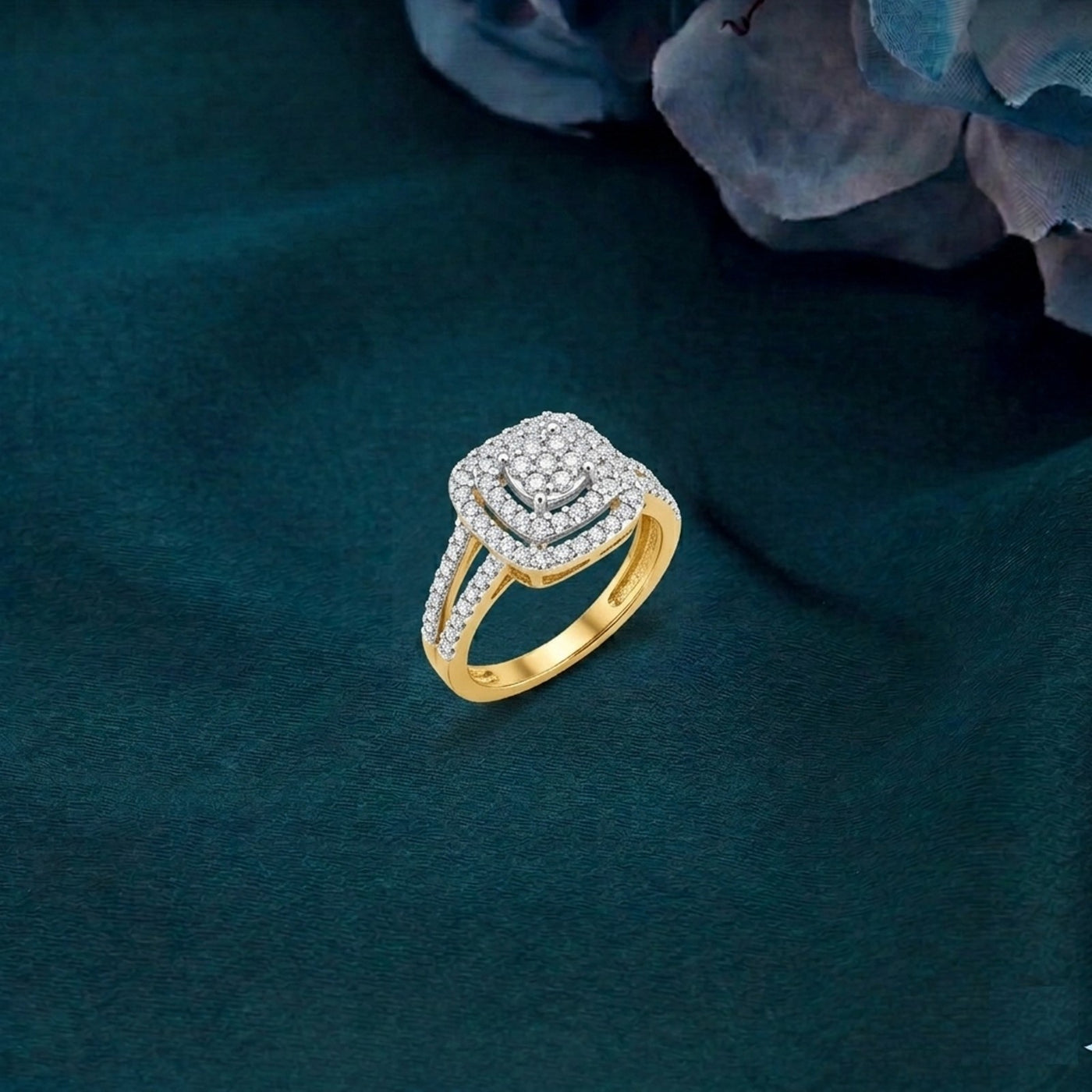 Gold ring with diamonds on a dark green textured background
