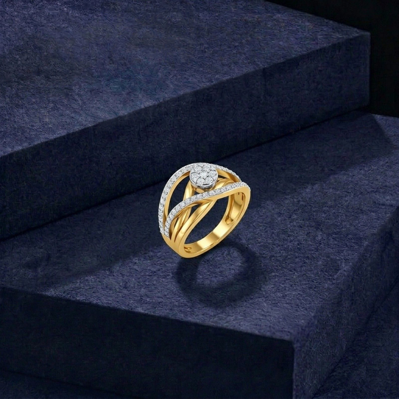 Gold ring with diamond accents on a blue surface.