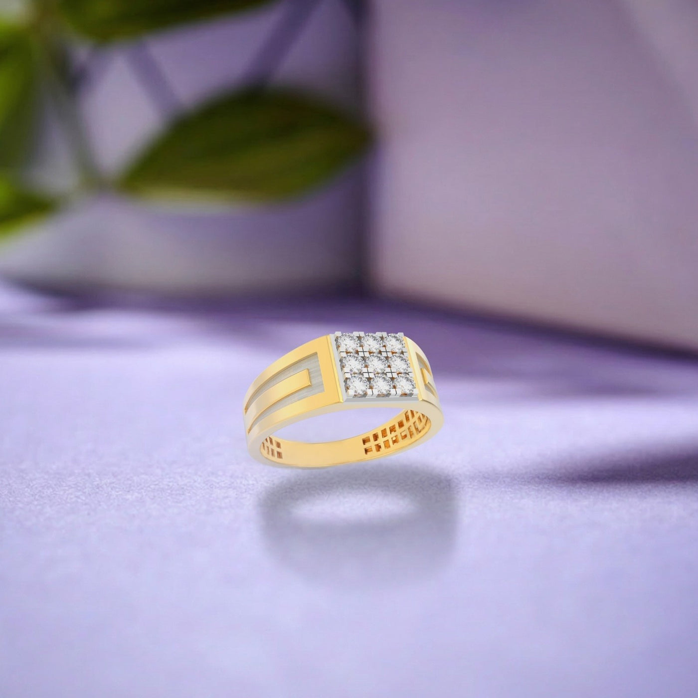 Gold ring with diamonds on a purple surface