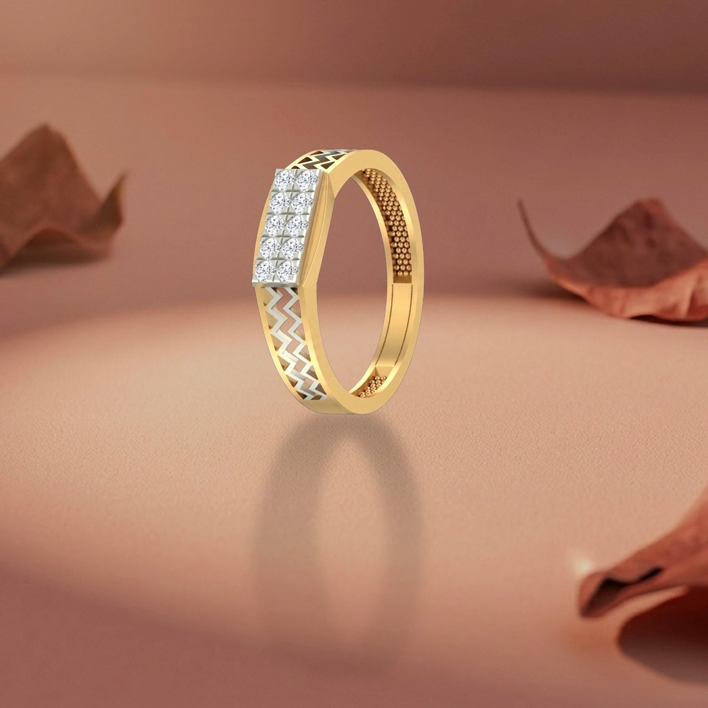 Gold ring with diamond accents on a brown background.