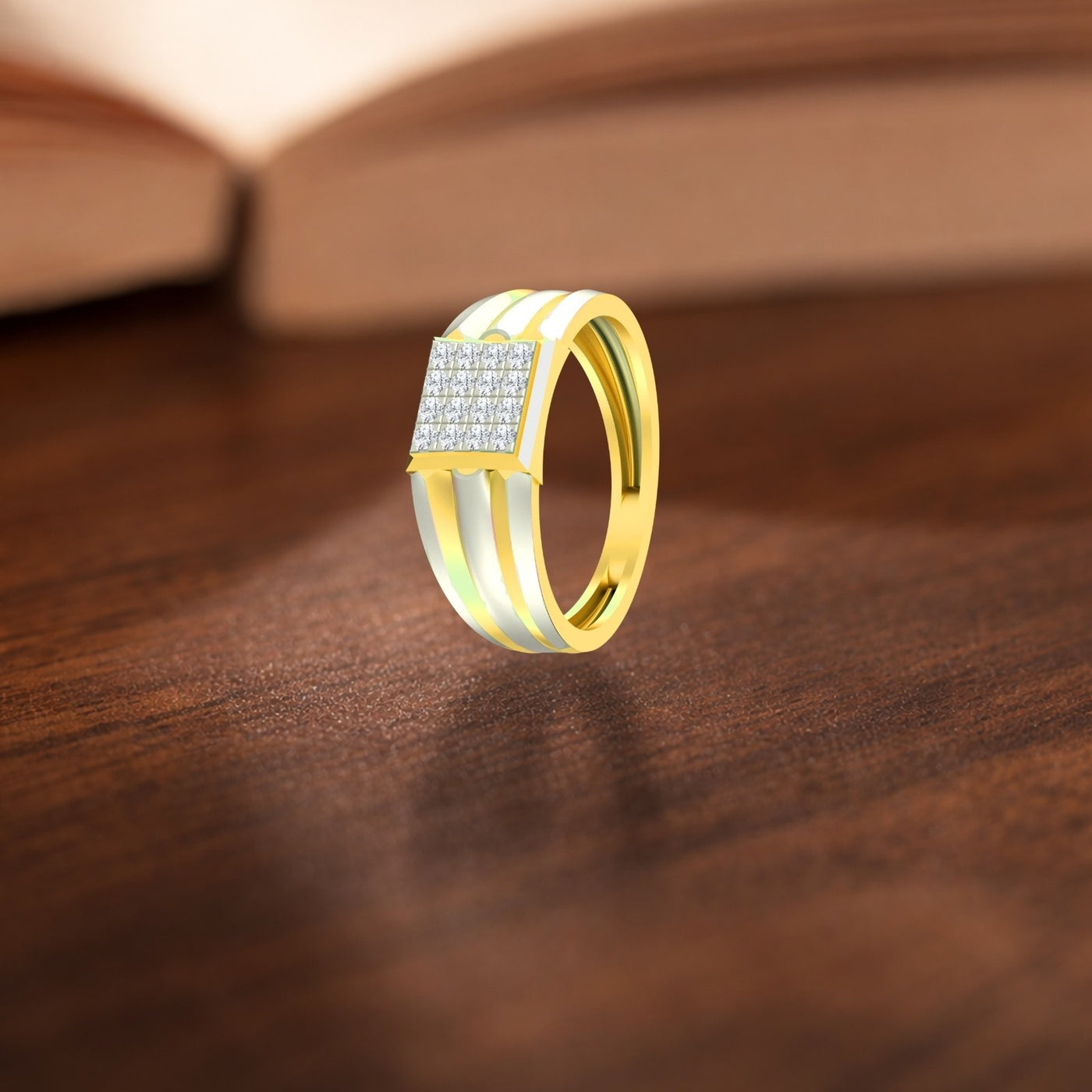 Gold and diamond mens ring on a wooden surface.