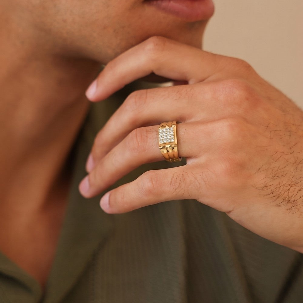 Close-up shots of a gold and diamond ring.