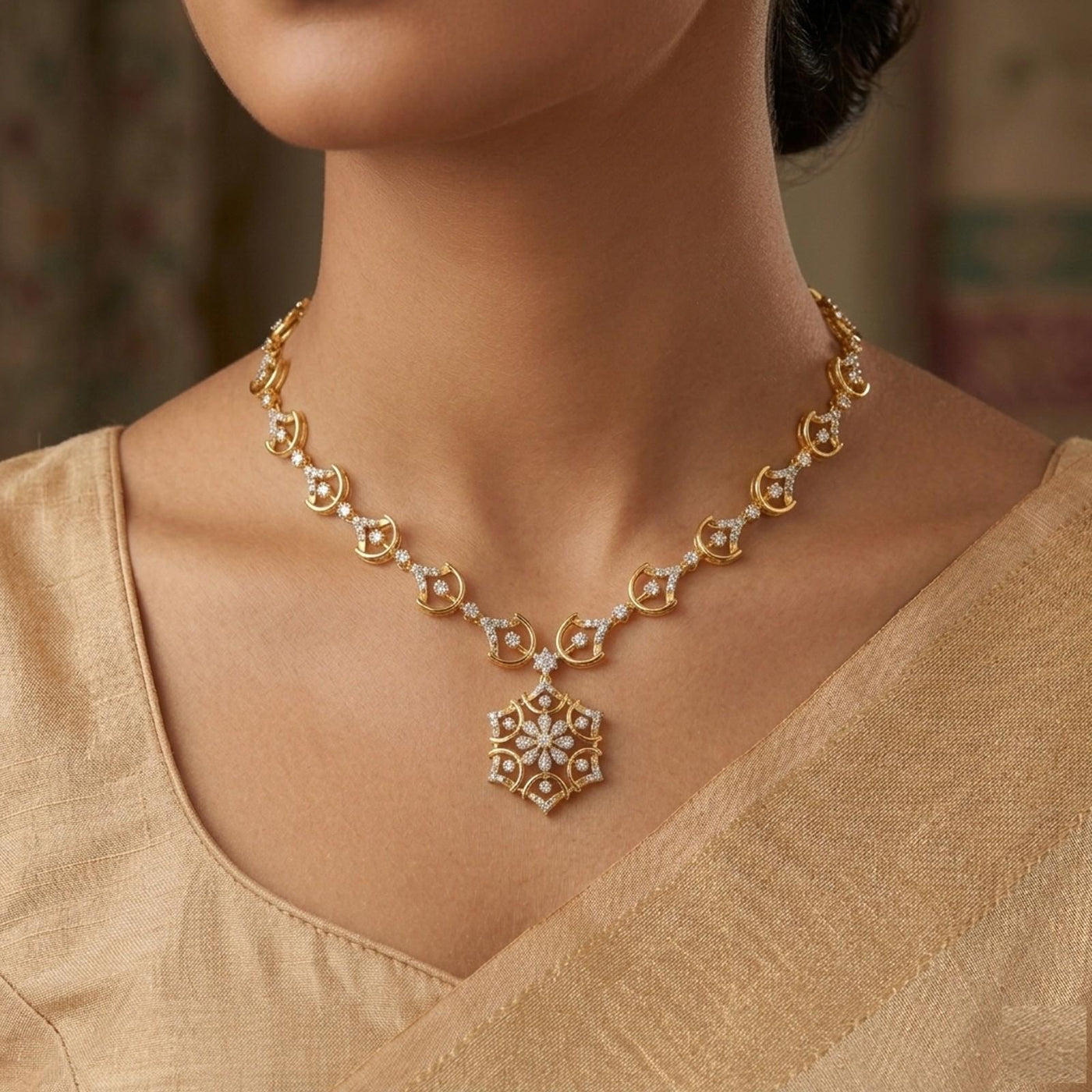 A gold necklace with a detailed floral and circular link motifs, worn by a model in a beige traditional.
