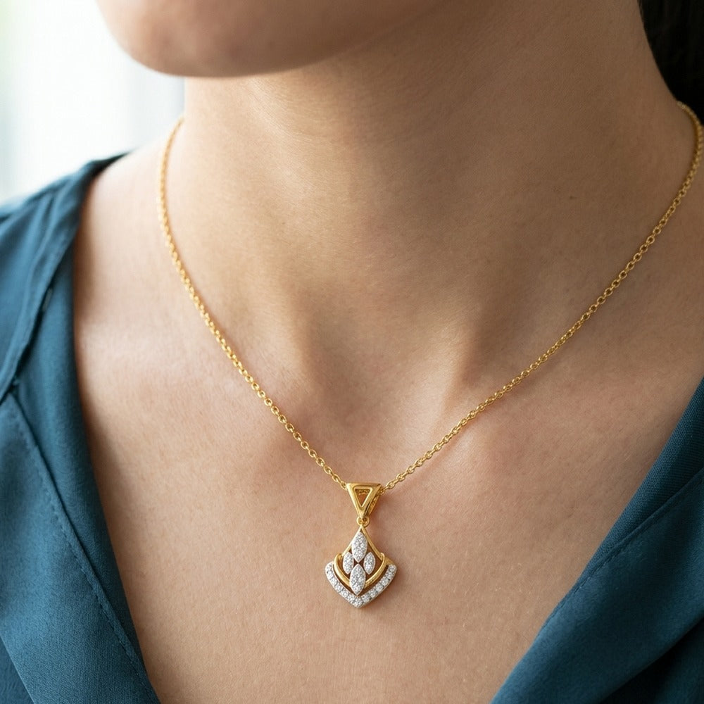 Women wearing Gold and diamond pendant