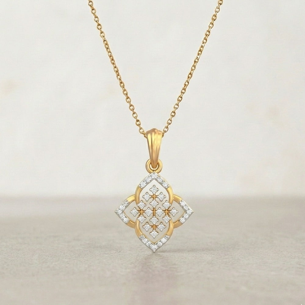 Yellow gold and diamond pendant on a white background